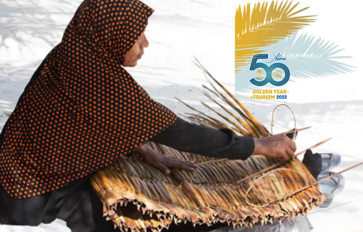 maldivian women on the golden beach